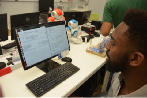 Dr. Ménager in the lab at graduate school