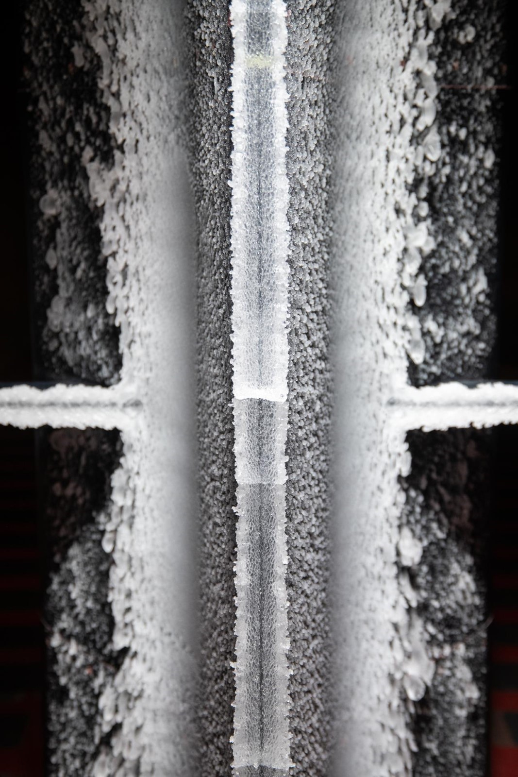 Ice accreted on the SIDRM test article under a supercooled liquid cloud.  Photographer: NASA/GRC/Jordan Salkin