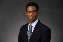 A person wearing a suit and tie

AI-generated content may be incorrect.