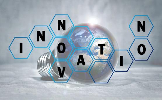 earth in lightbulb with INNOVATION text
