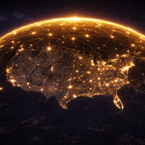 AI-generated illustration of a gold digital connectivity dome over the continental United States (generated with DALL·E via ChatGPT, Jan. 14, 2026)